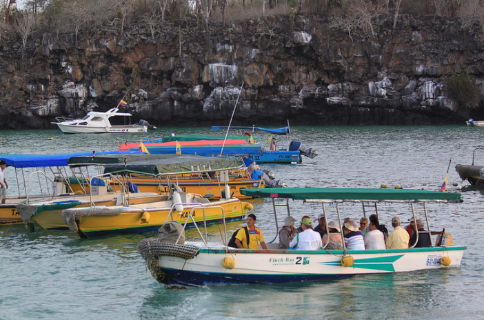Tourists in a water taxi in Puerto Ayora